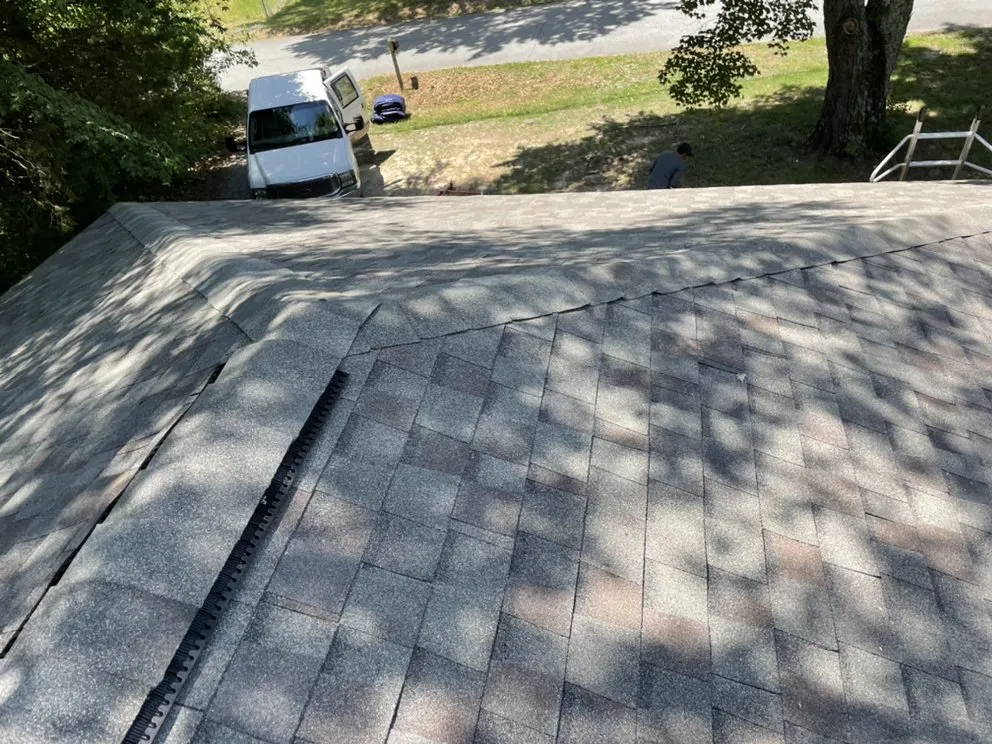 Slide of Revelation Roofing