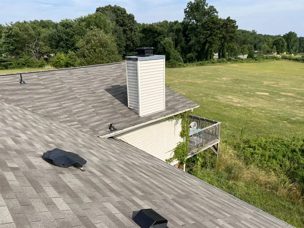 Slide of Revelation Roofing