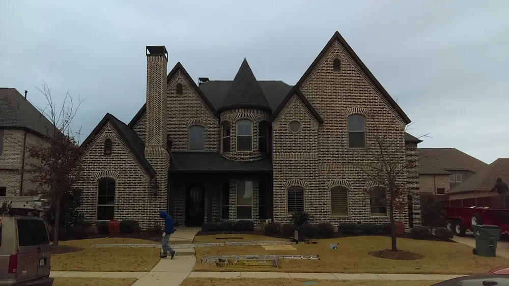 Slide of Reveles Roofing