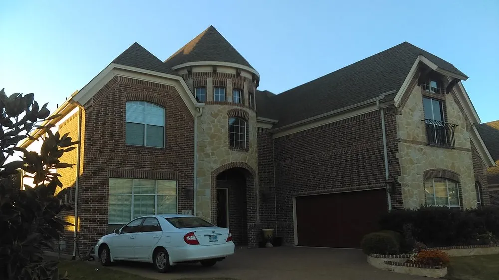 Slide of Reveles Roofing