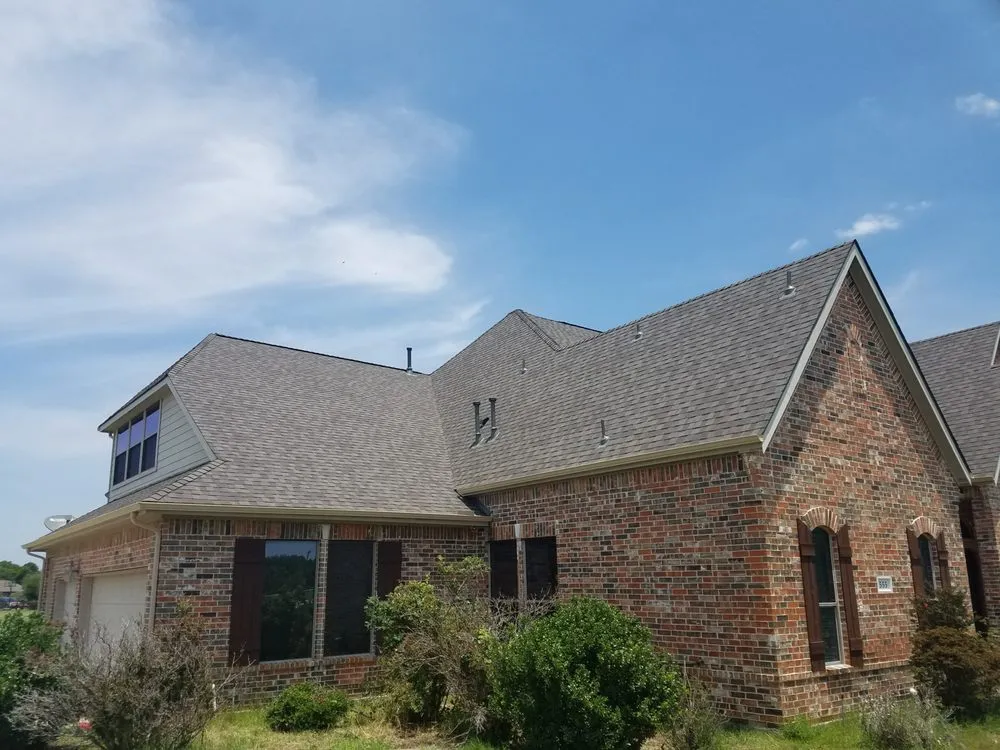 Slide of Revival Roofing