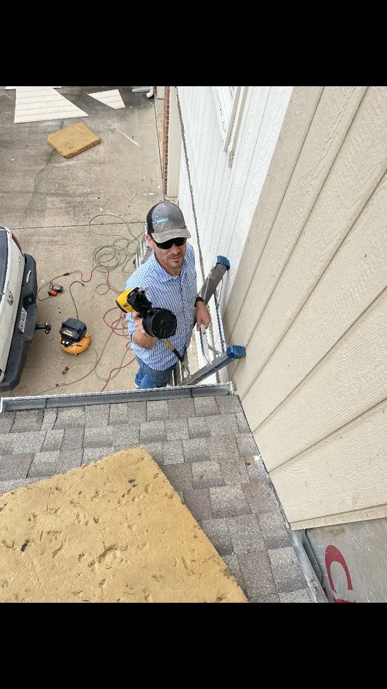 Slide of Revival Roofing