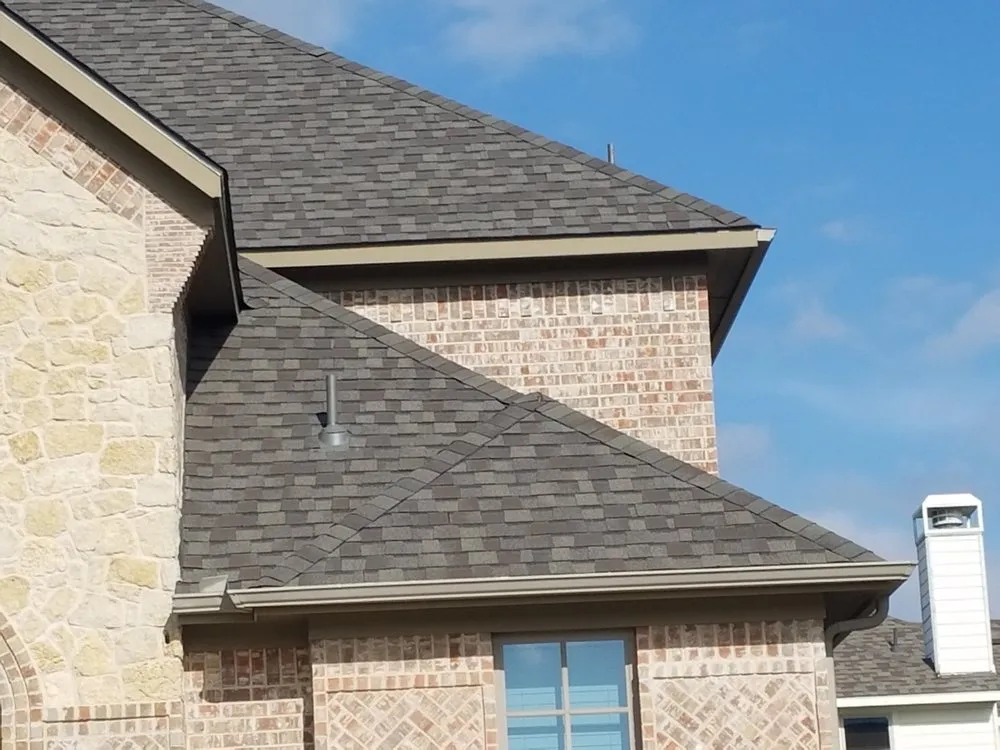 Slide of Revival Roofing