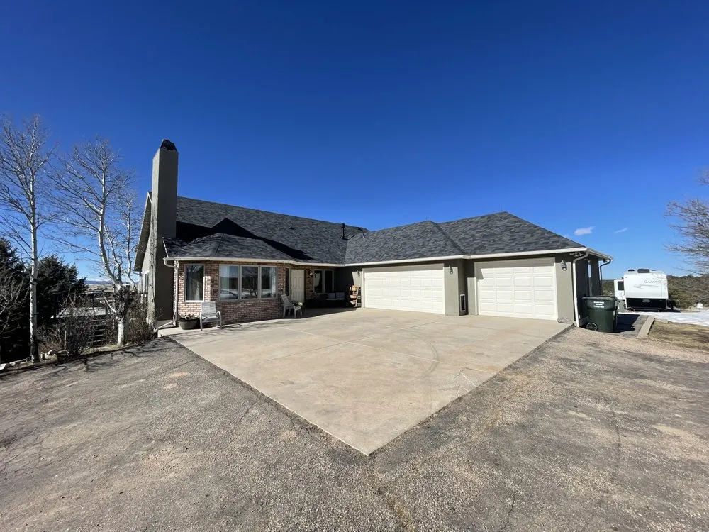 Slide of Revival Roofing