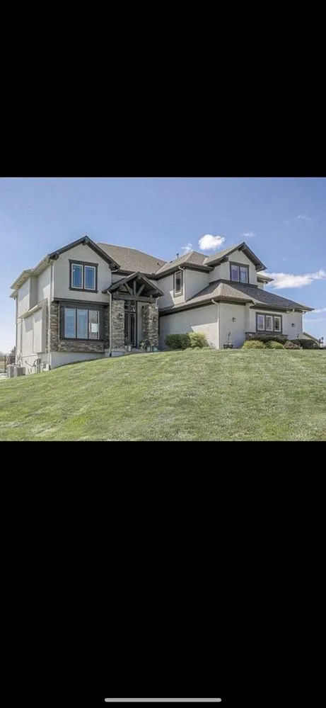 Slide of Revival Roofing