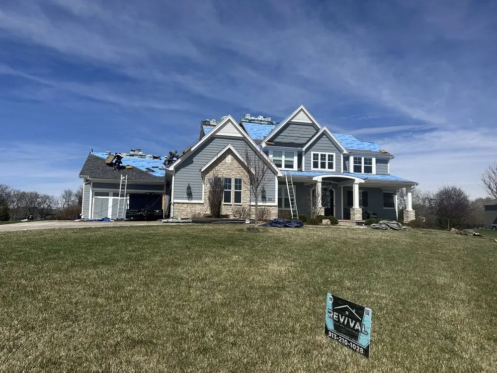 Slide of Revival Roofing