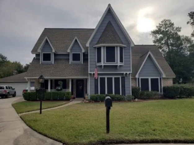 Slide of Revival Roofing