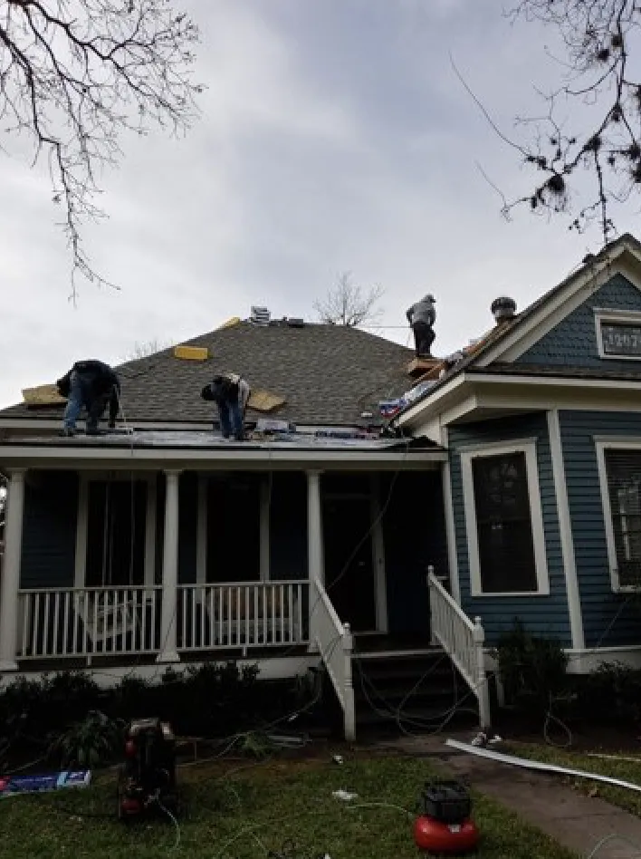 Slide of Revival Roofing