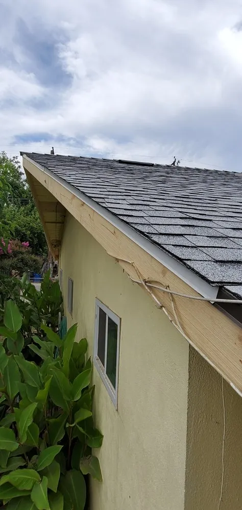 Slide of Revival Roofing