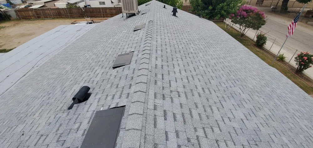 Slide of Revival Roofing