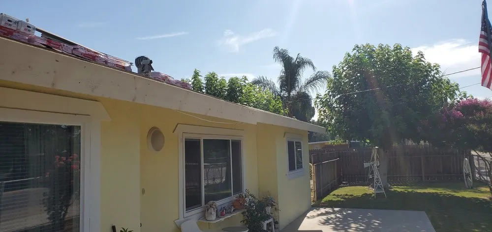 Slide of Revival Roofing