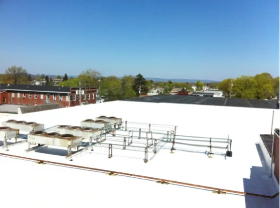 Slide of Revolution Roofing Group