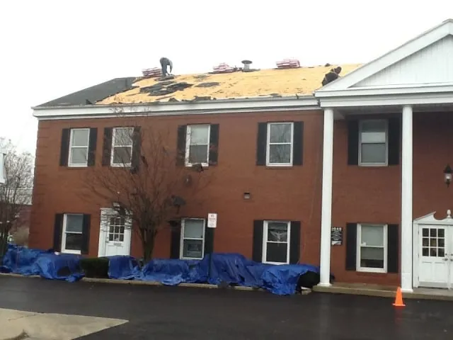 Slide of Revolution Roofing Group