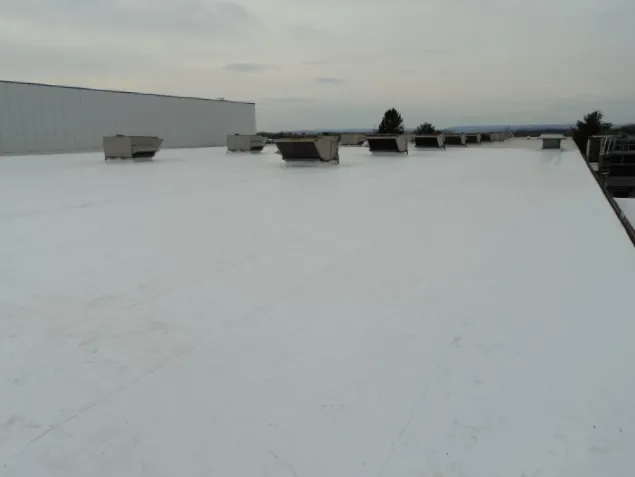 Slide of Revolution Roofing Group