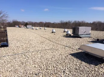 Slide of Revolution Roofing Group