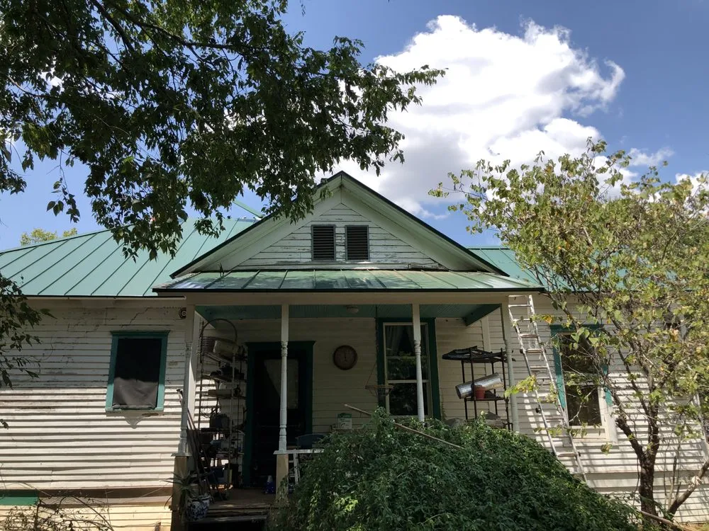 Slide of Revolutionary Roofing & Restoration