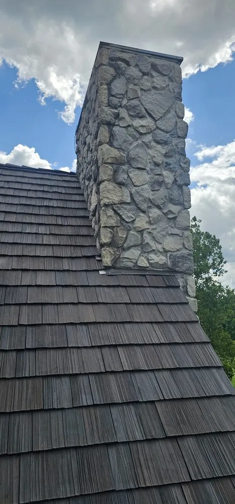 Licensed residential roofing service in St Louis, MO by Revolve Construction