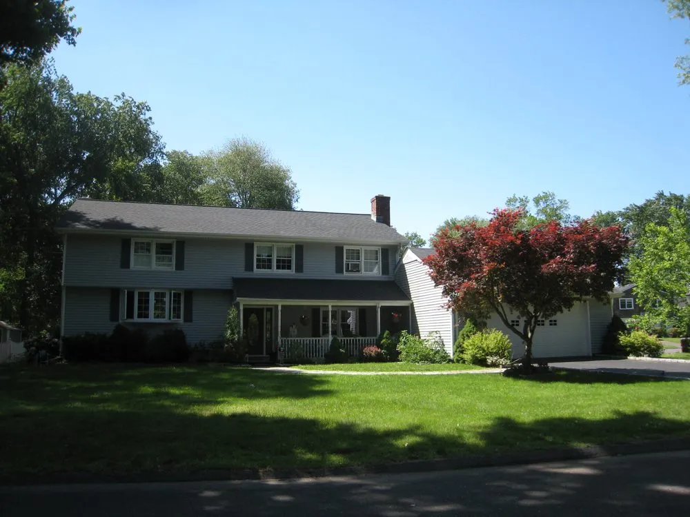 Slide of Rex Roofing Co. of Stamford, Inc.