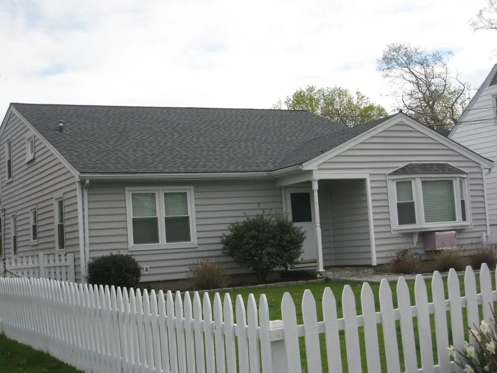 Slide of Rex Roofing Co. of Stamford, Inc.