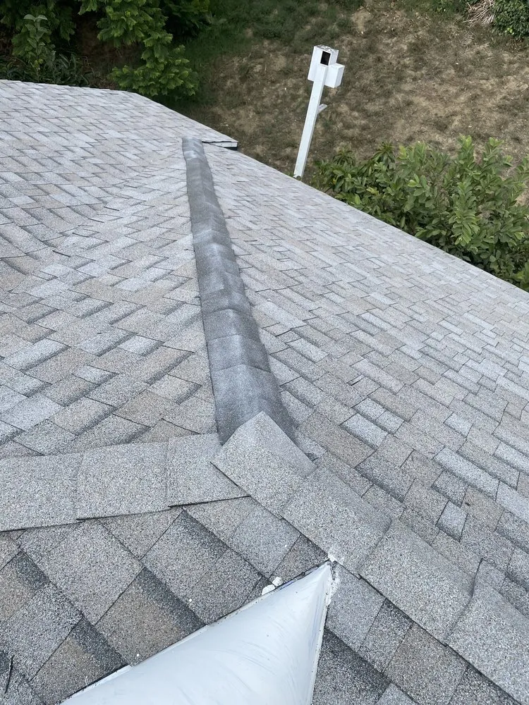 Slide of Rex Roofing