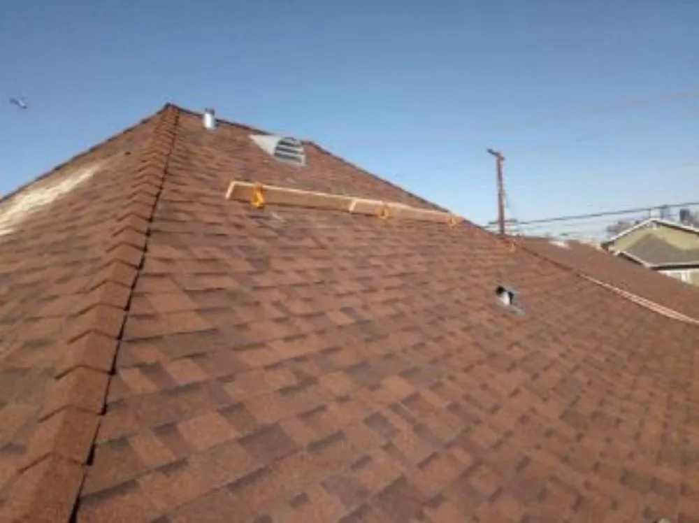 Slide of Rex Roofing