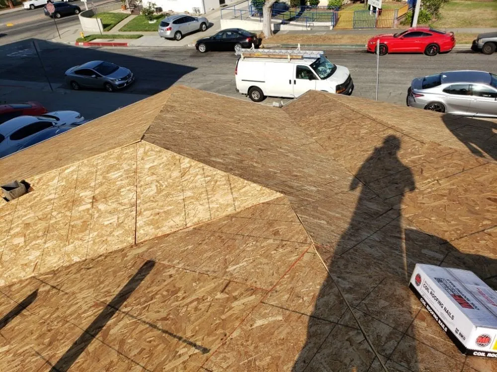 Slide of Rex Roofing