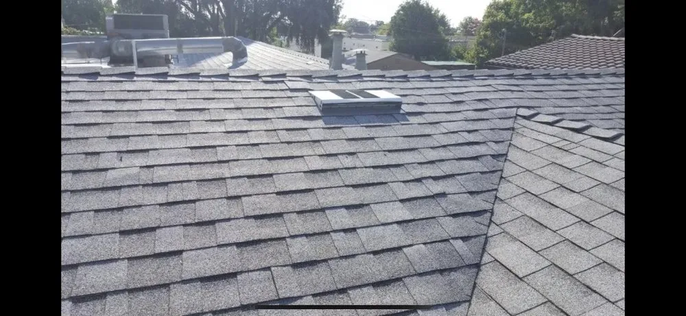 Slide of Rex Roofing