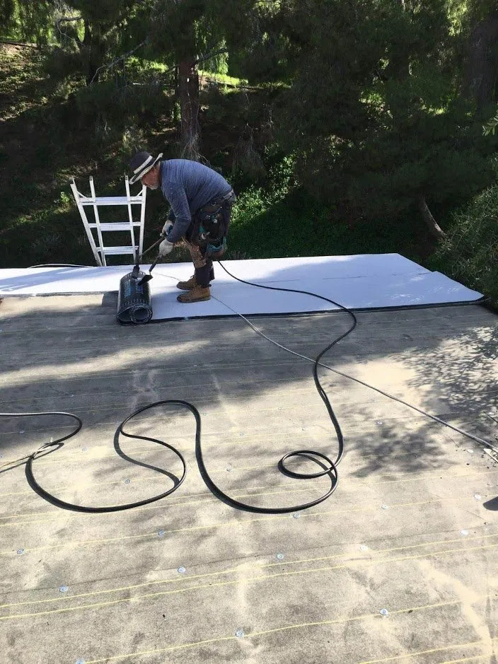 Slide of Rex Roofing