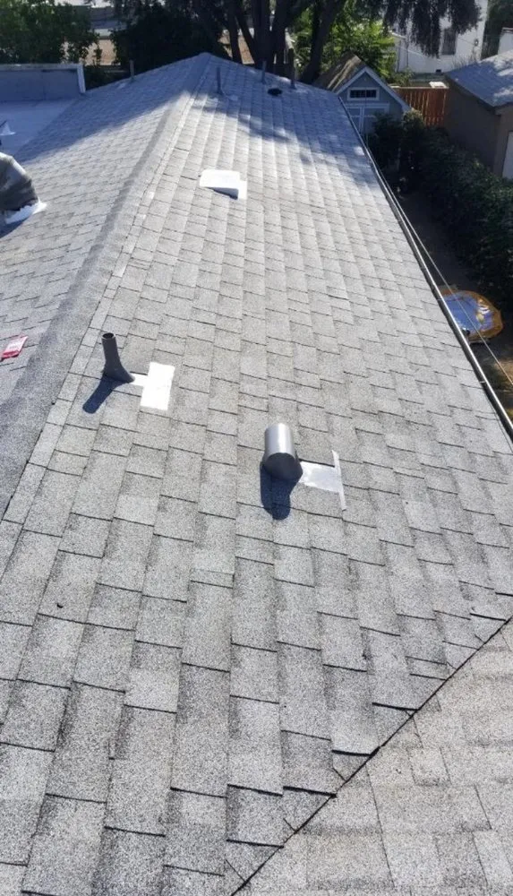 Slide of Rex Roofing