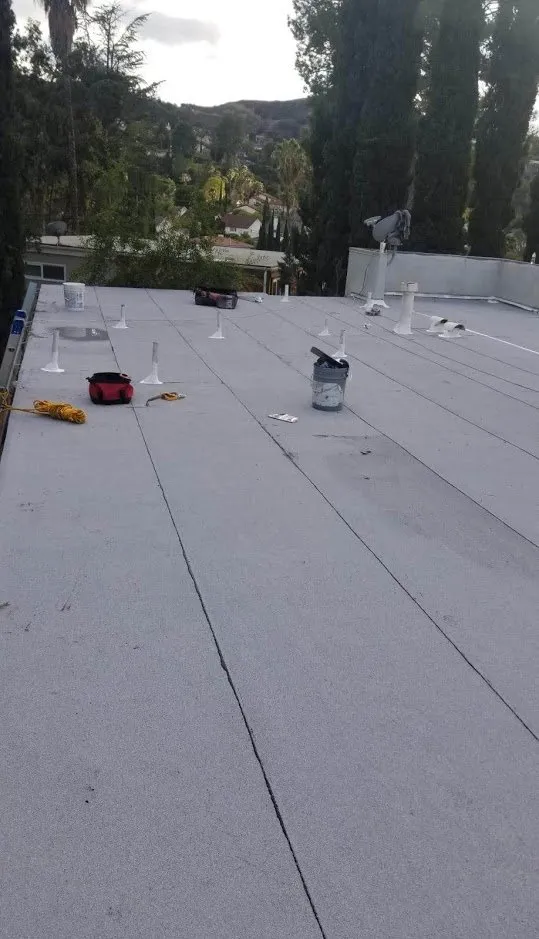 Slide of Rex Roofing