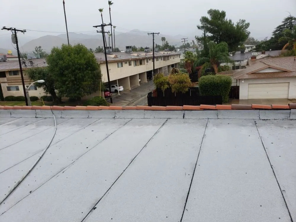 Slide of Rex Roofing