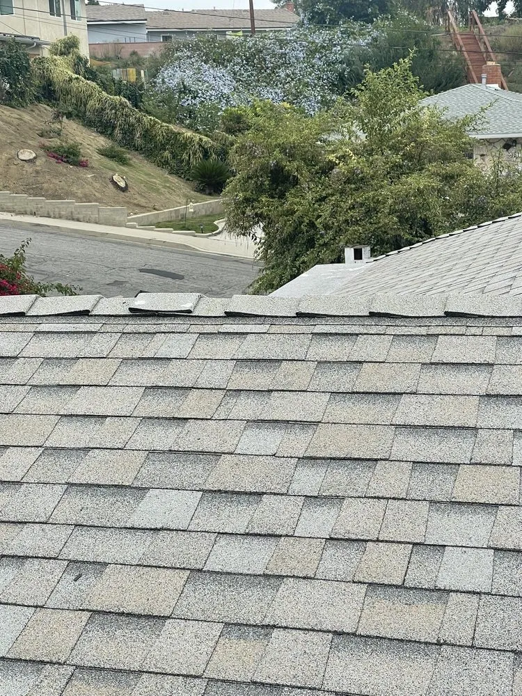 Slide of Rex Roofing