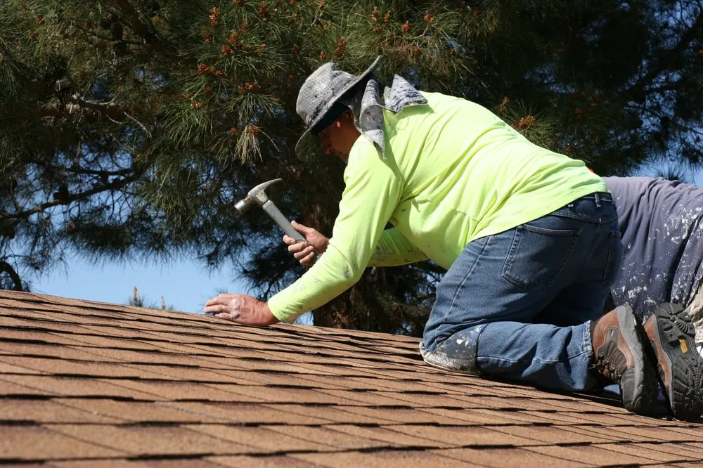 Slide of Rey My Roofer