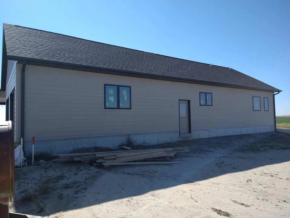 Slide of Rey Roofing & Seamless Gutters