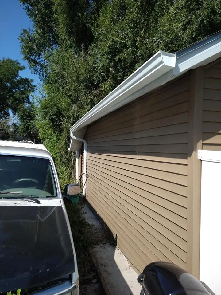 Slide of Rey Roofing & Seamless Gutters