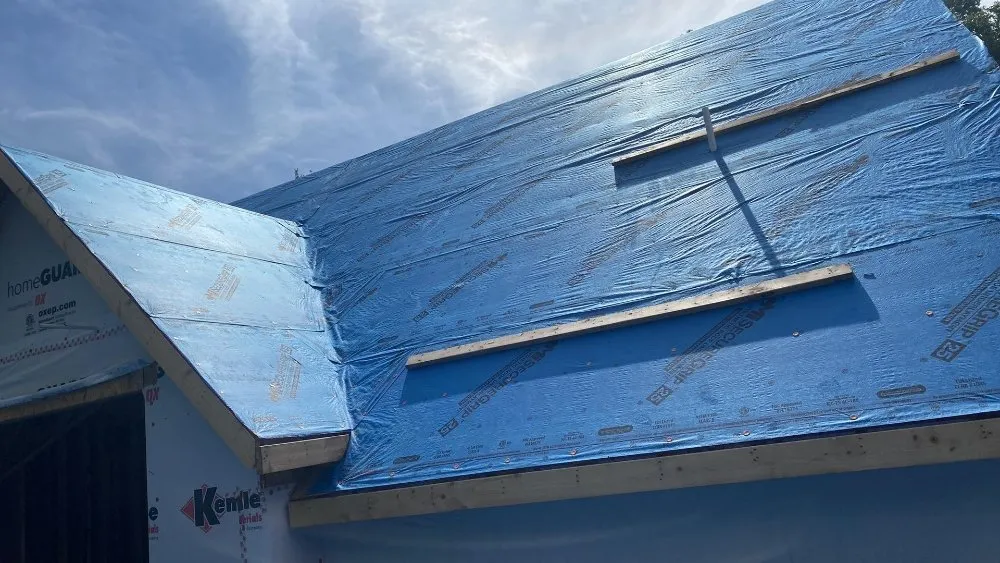 Slide of Reyes Master Roofing