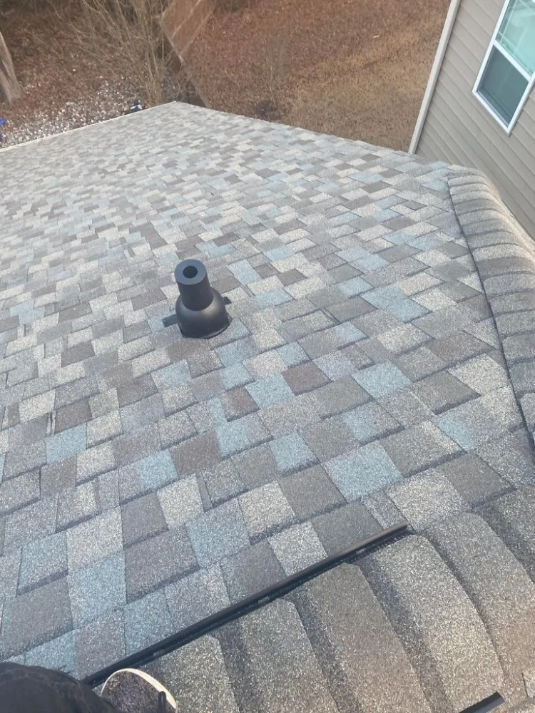 Slide of Reyes Master Roofing