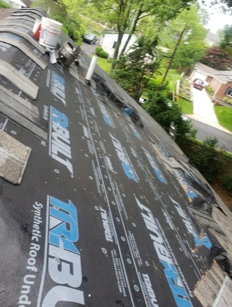 Slide of Reyes Master Roofing