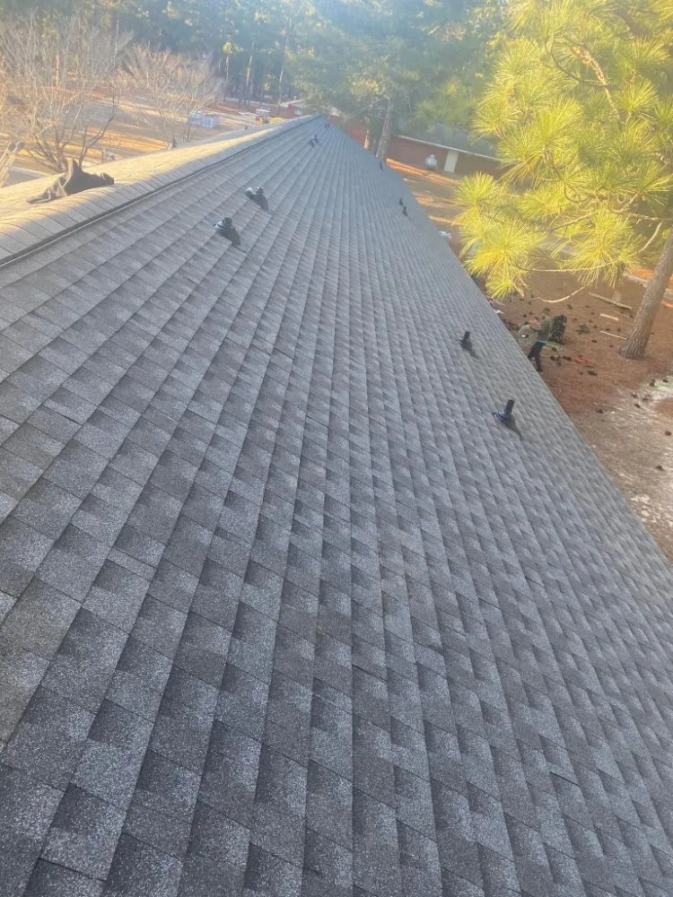 Slide of Reyes Master Roofing