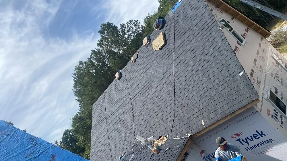 Slide of Reyes Master Roofing