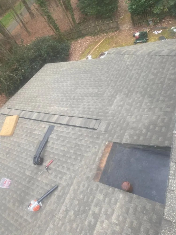 Slide of Reyes Master Roofing