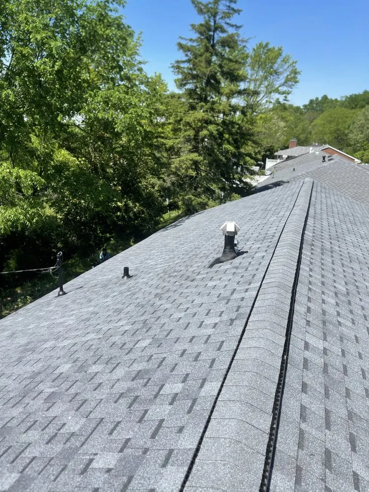 Slide of Reyes Quality Roofing