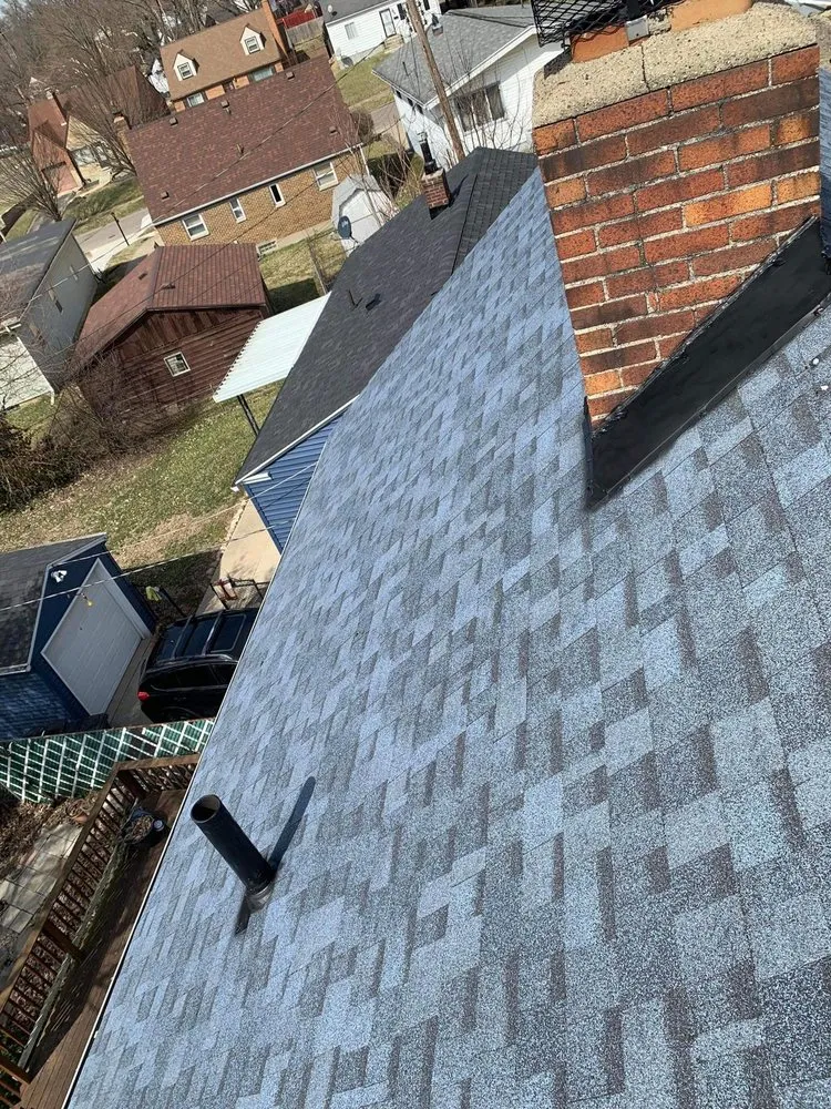 Slide of Reyes Quality Roofing