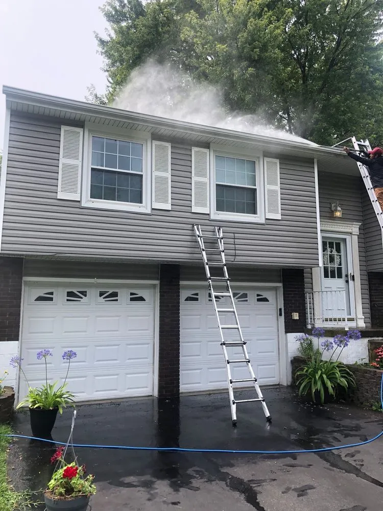 Slide of Reyes Quality Roofing