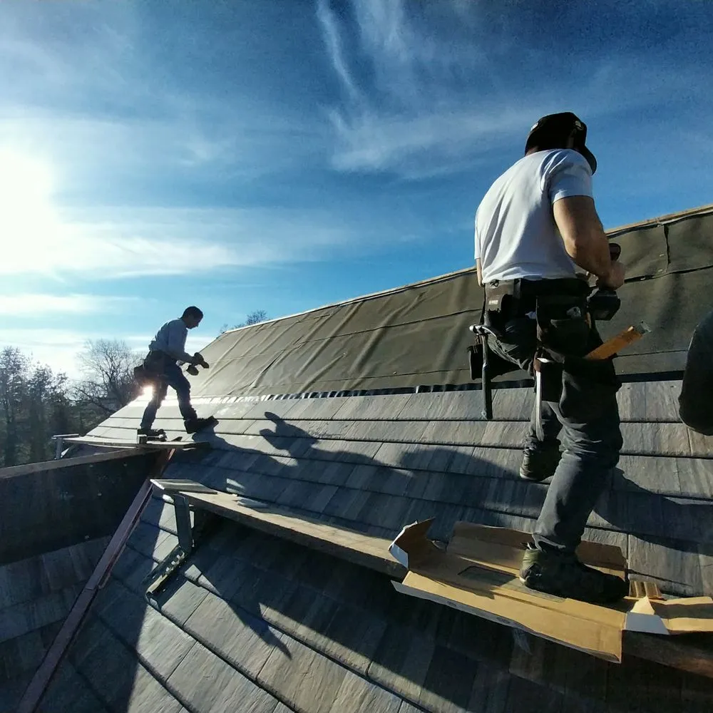Slide of Reyes Roof Construction