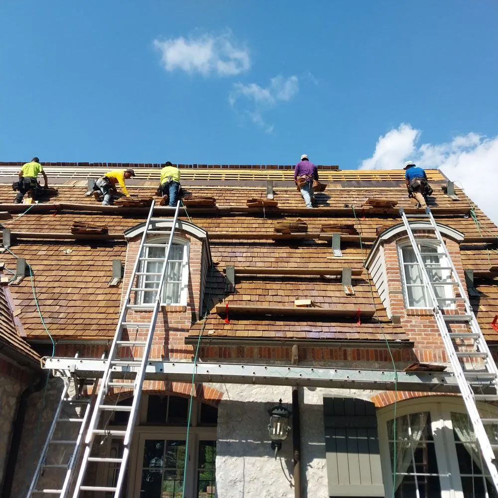 Slide of Reyes Roof Construction