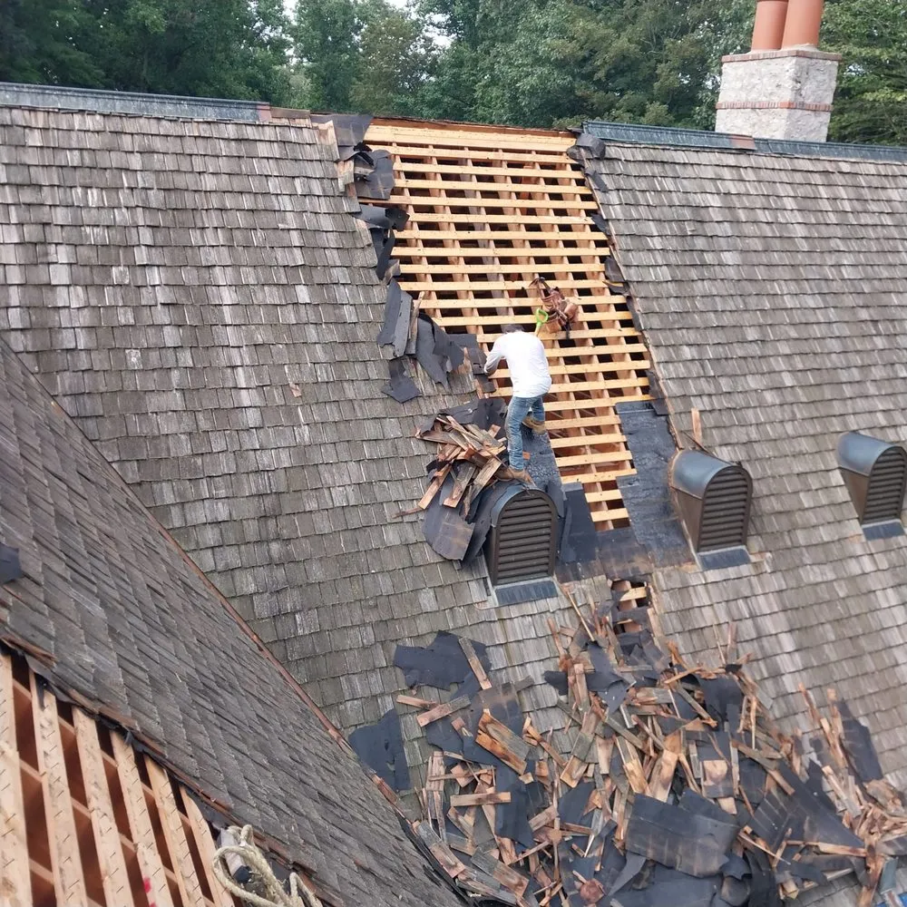 Slide of Reyes Roof Construction