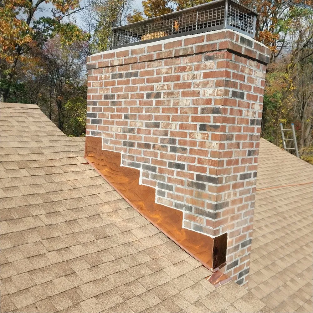 Slide of Reyes Roof Construction