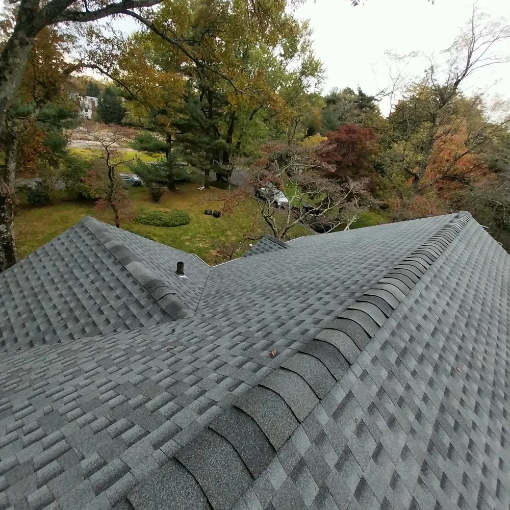 Slide of Reyes Roof Construction