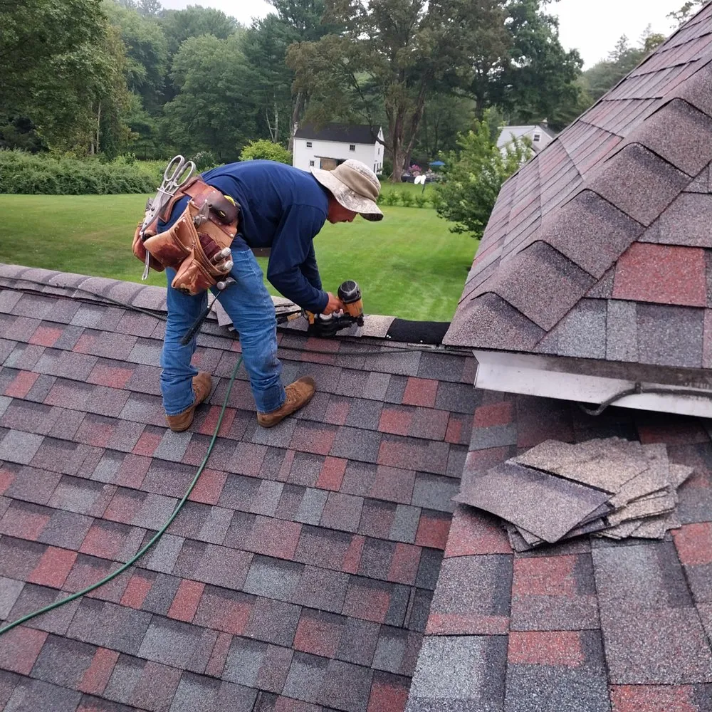 Slide of Reyes Roof Construction